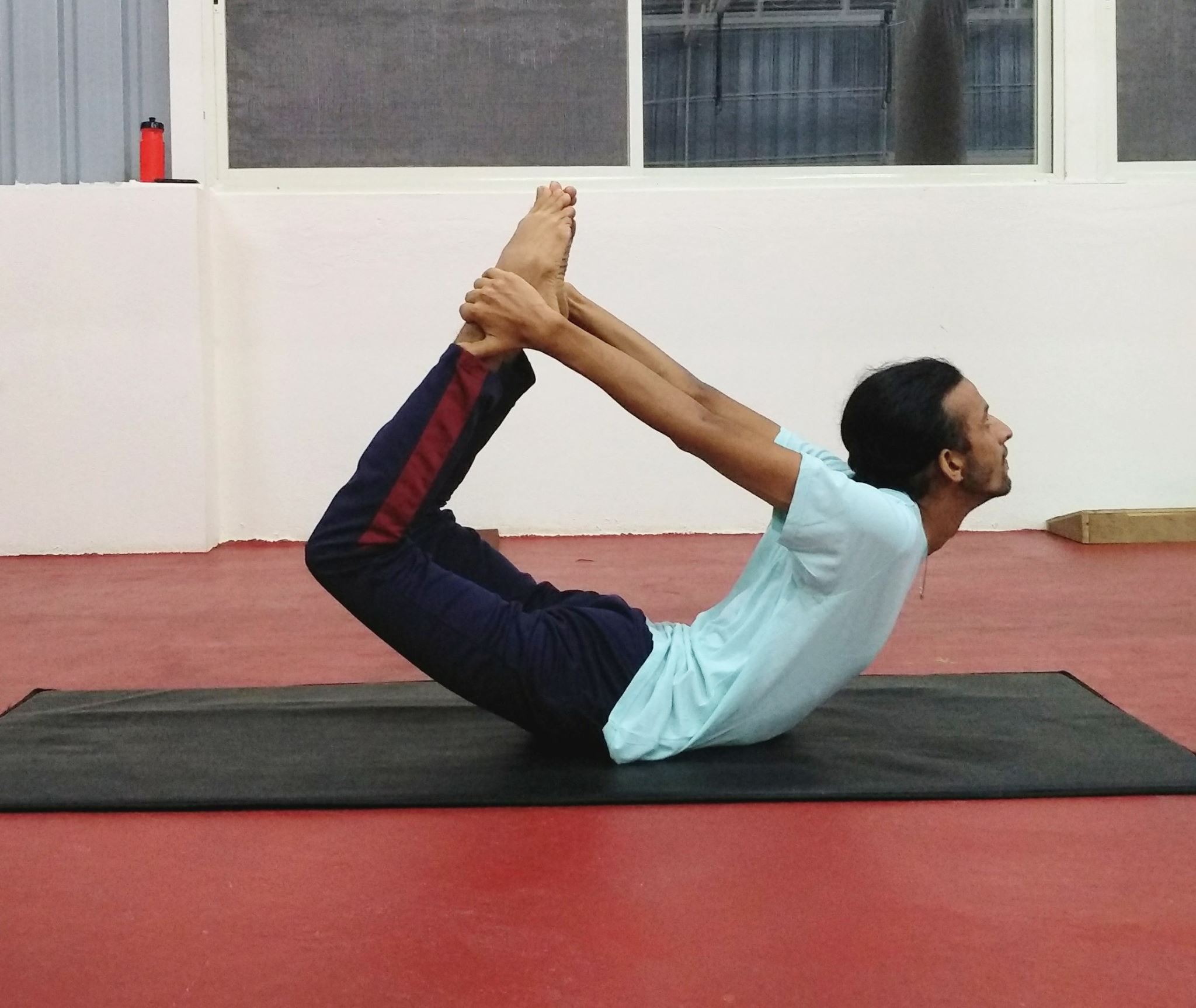 Dhanurasana (Bow Pose) Dhanurasana (Bow Pose)